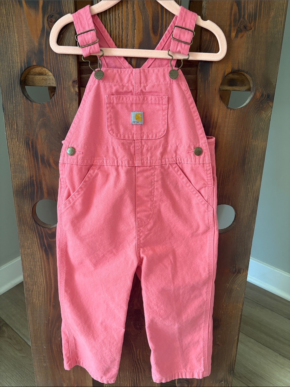 Carhartt girl’s loose fitted canvas bib overalls
